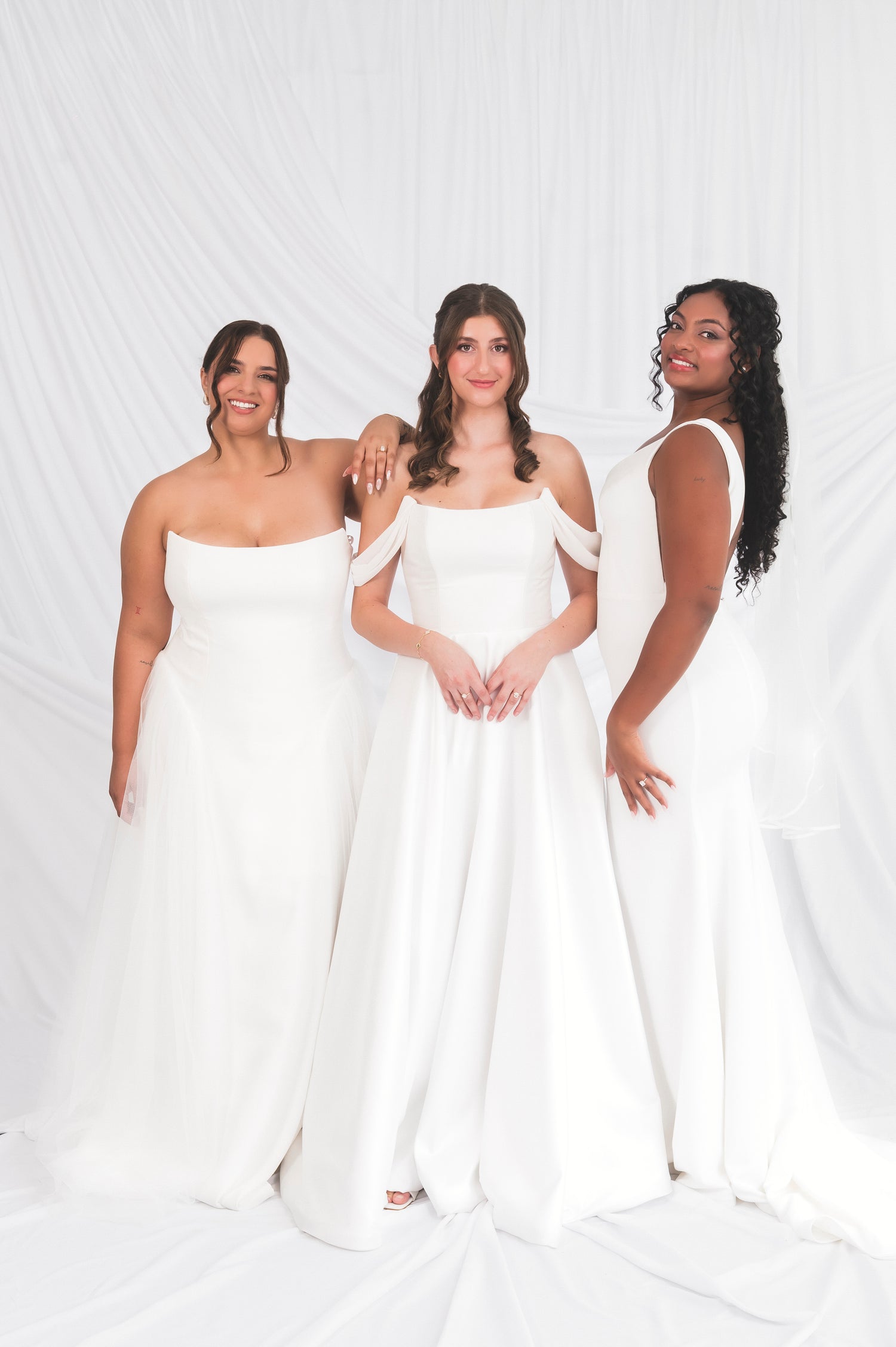 Three models at Always Knew Ottawa Size Inclusive Bridal Boutique