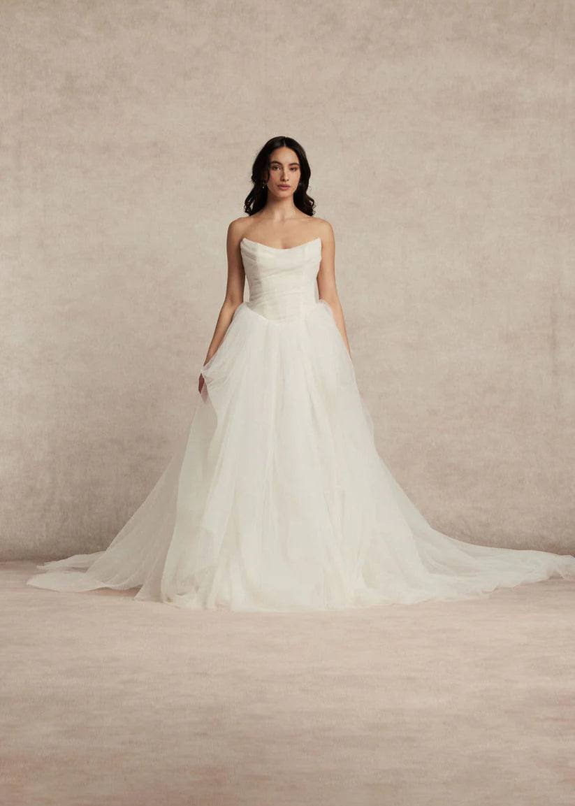 Meet Zara, a pleated tulle romantic ball gown with draped bodice, basque waist and voluminous skirt.