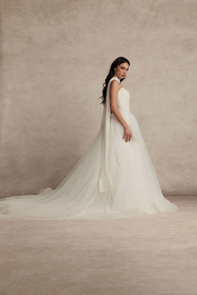 Meet Zara, a pleated tulle romantic ball gown with draped bodice, basque waist and voluminous skirt.