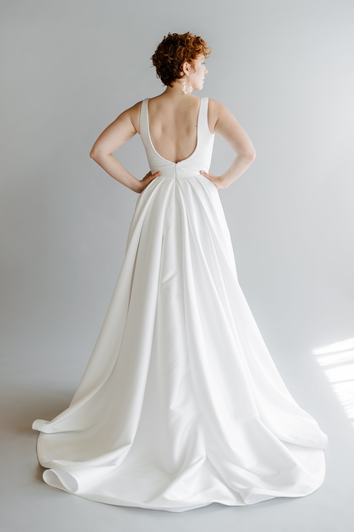 Model wearing the Sierra in mikado - back full body view