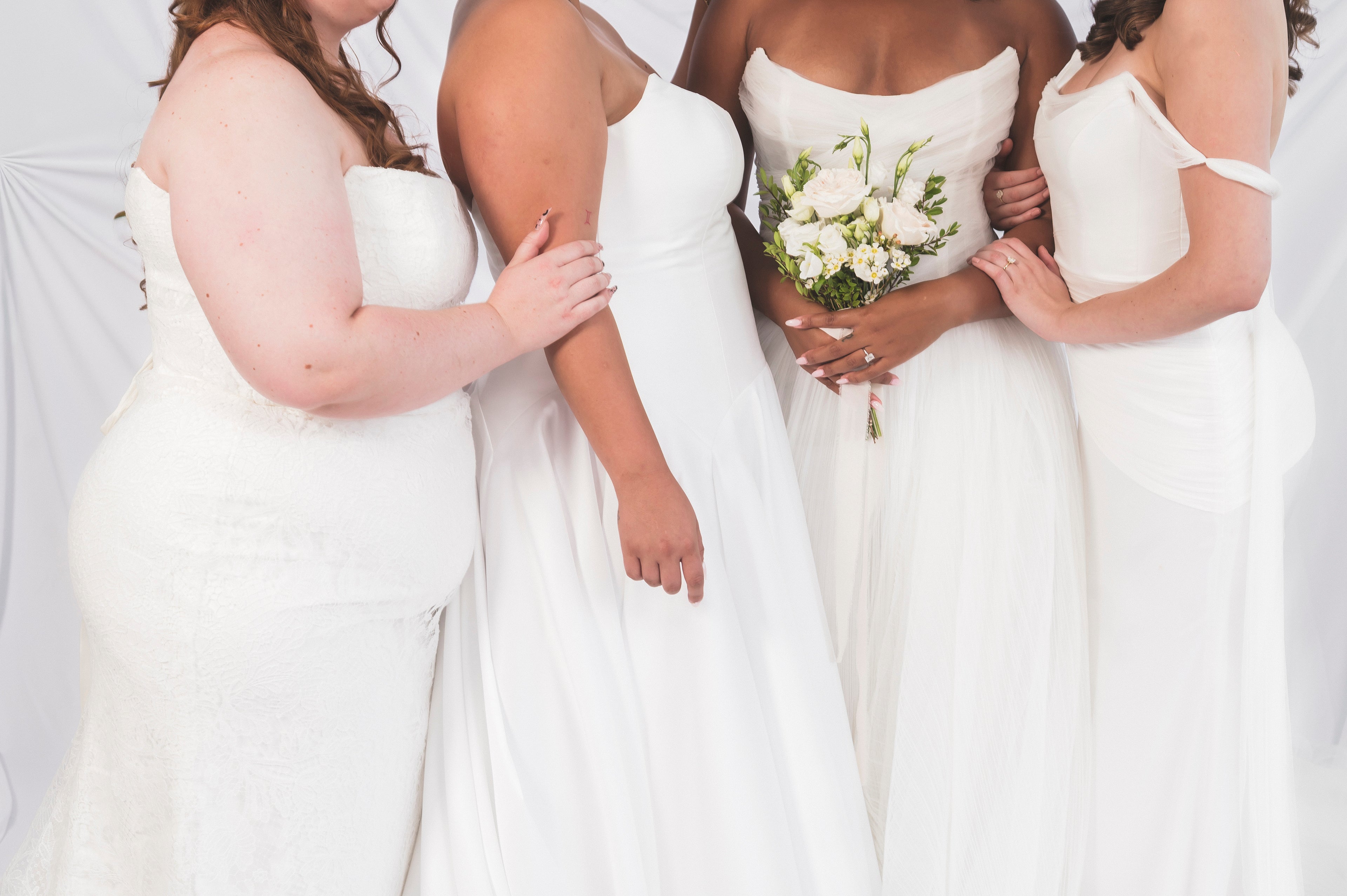 Plus Size and mid size wedding dresses on models for Always Knew Bridal Shop in Ottawa