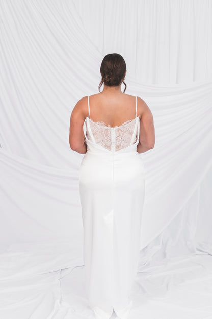 Plus Size Bride in Ottawa with a see through peekaboo lace and floral eyelash lace. Column Shift Back with minimal slit