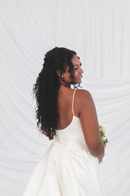 Back View of the Poppy/Laura gown, scooped ivory backline with a satin narrow strap. 