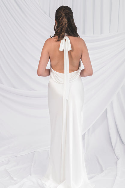 Back view of the high neck bow weddign dress, no train column and fitted wedding dress