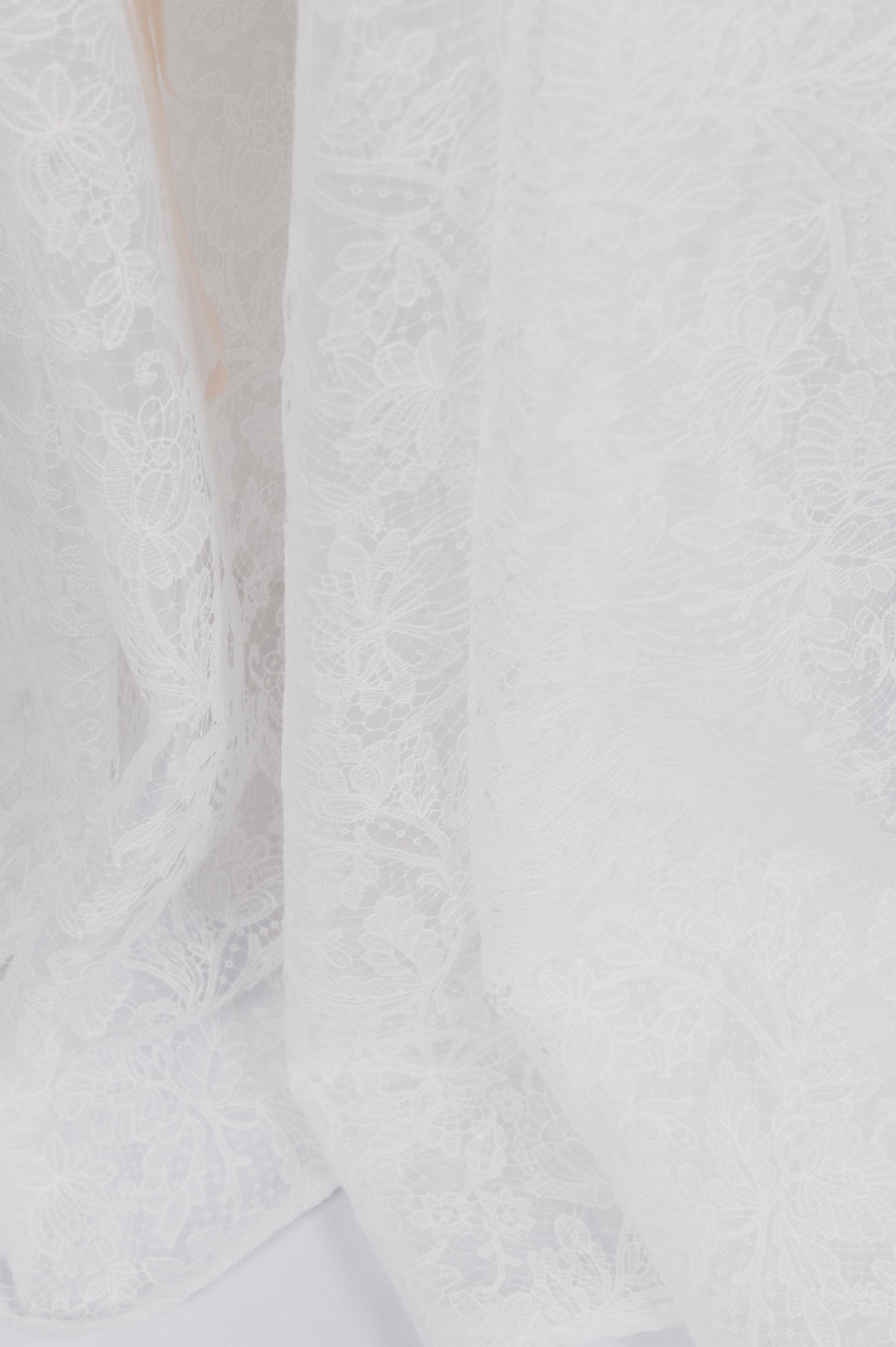 Close-up of textured white fabric avaialble on the Sierra Gown