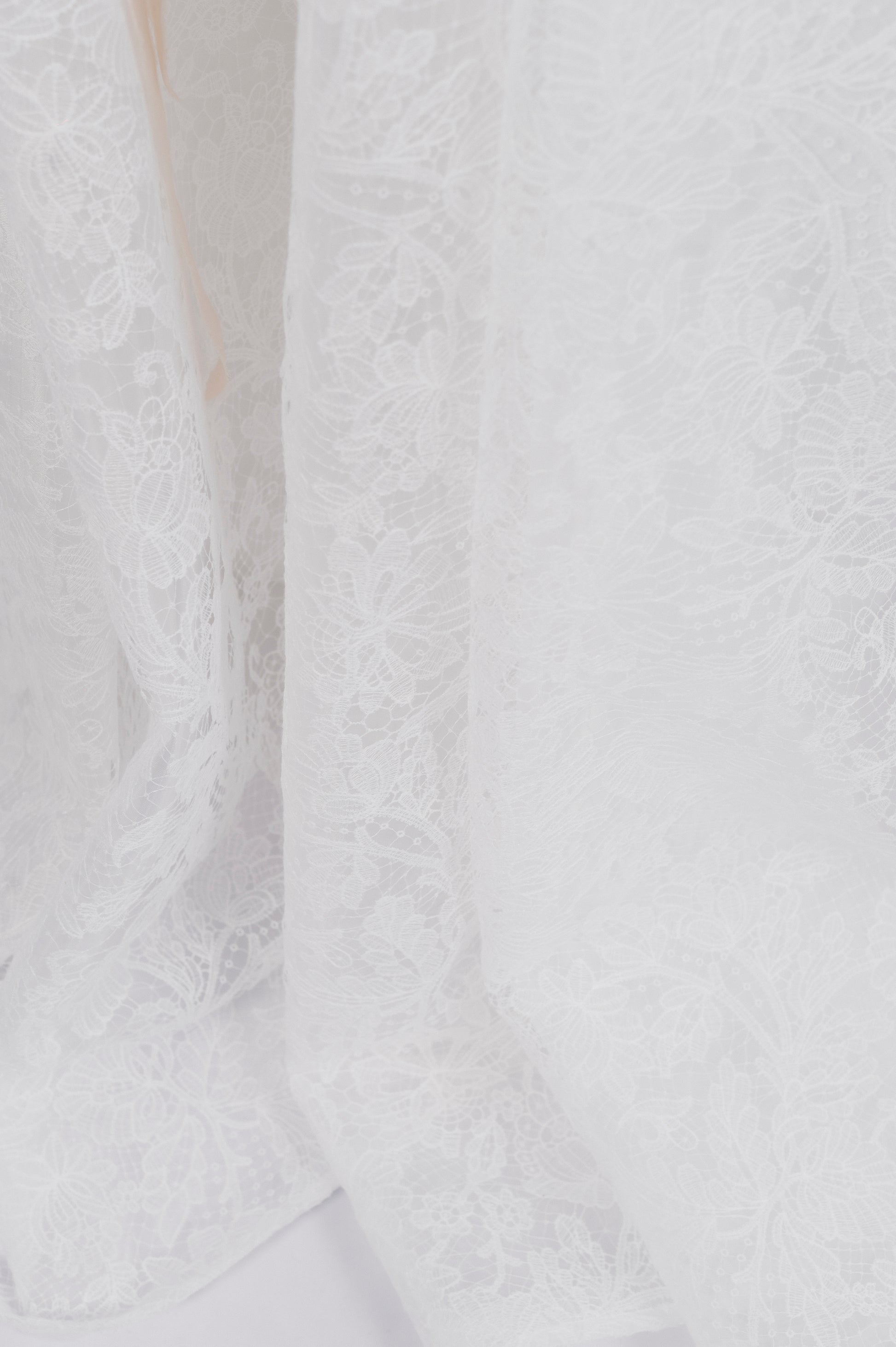 Close-up of textured white fabric avaialble on the Sierra Gown
