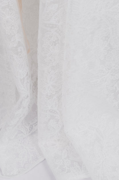 Close-up of textured white fabric avaialble on the Sierra Gown