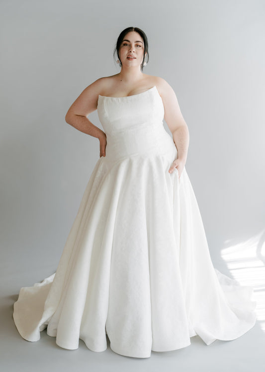 A model wearing Lauralie in cotton burnout fabric - full body front view
