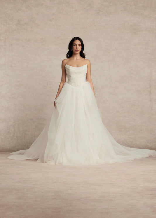 Meet Zara, a pleated tulle romantic ball gown with draped bodice, basque waist and voluminous skirt.