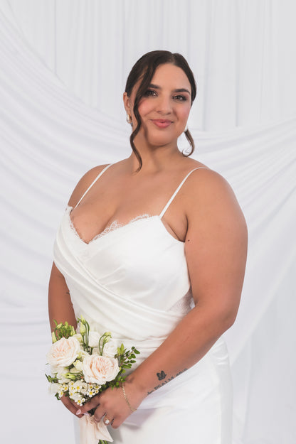 Plus size wedding dress with satin and lace, minimal wedding dress and narrow strap. Draped bodice and simple skirt.