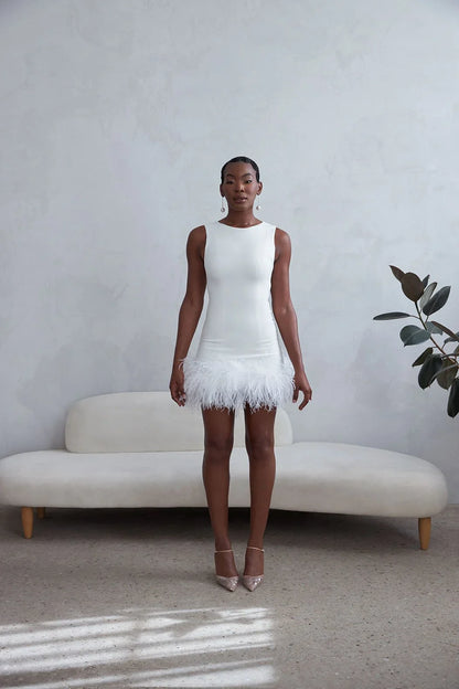 Nagode | Feathered Mini