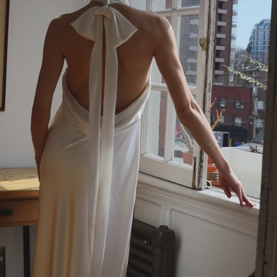 Closeup of the Laurene Bow at the Back of the Open Back Satin Wedding Dress