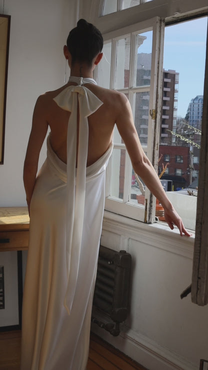 Closeup of the Laurene Bow at the Back of the Open Back Satin Wedding Dress