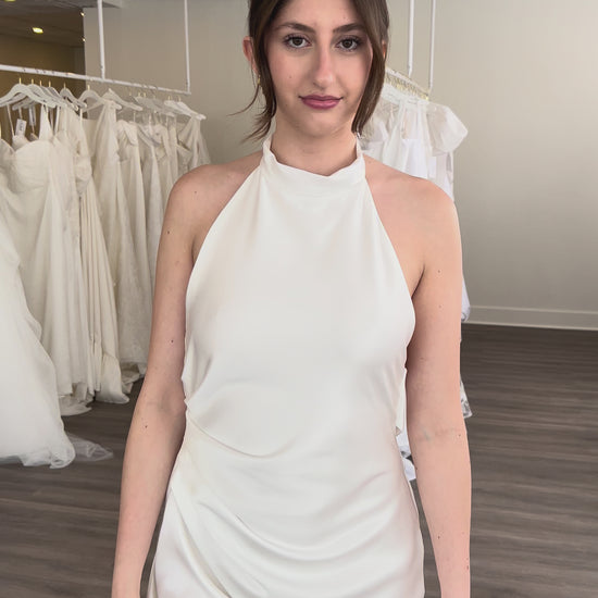 Closeup of the ouma laurene high neck wedding dress on our model Dali in our Always Knew Canadian Made wedding showroom