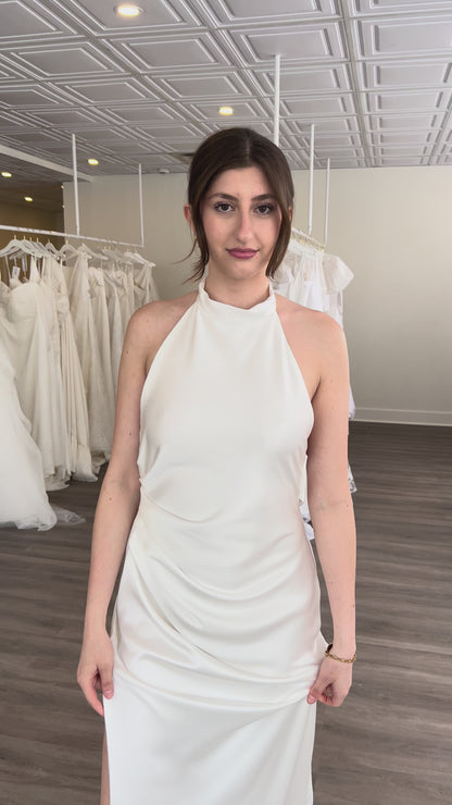 Closeup of the ouma laurene high neck wedding dress on our model Dali in our Always Knew Canadian Made wedding showroom