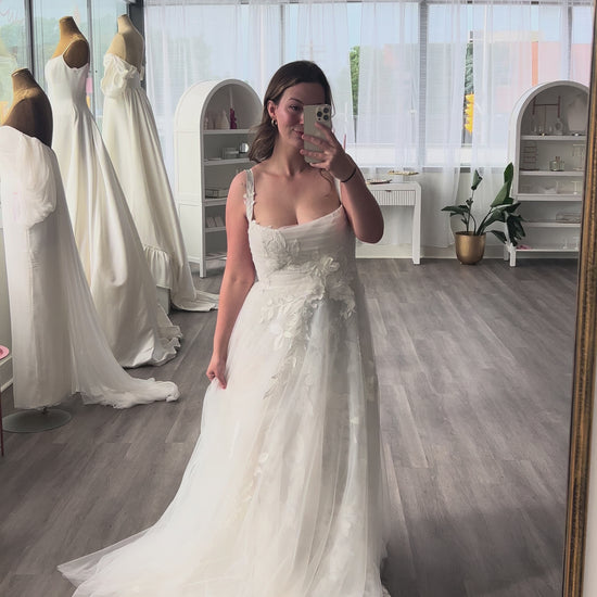 Gia by Ouma Bridal with a flowy soft aline featuring floral tulles and delicate lace appliques