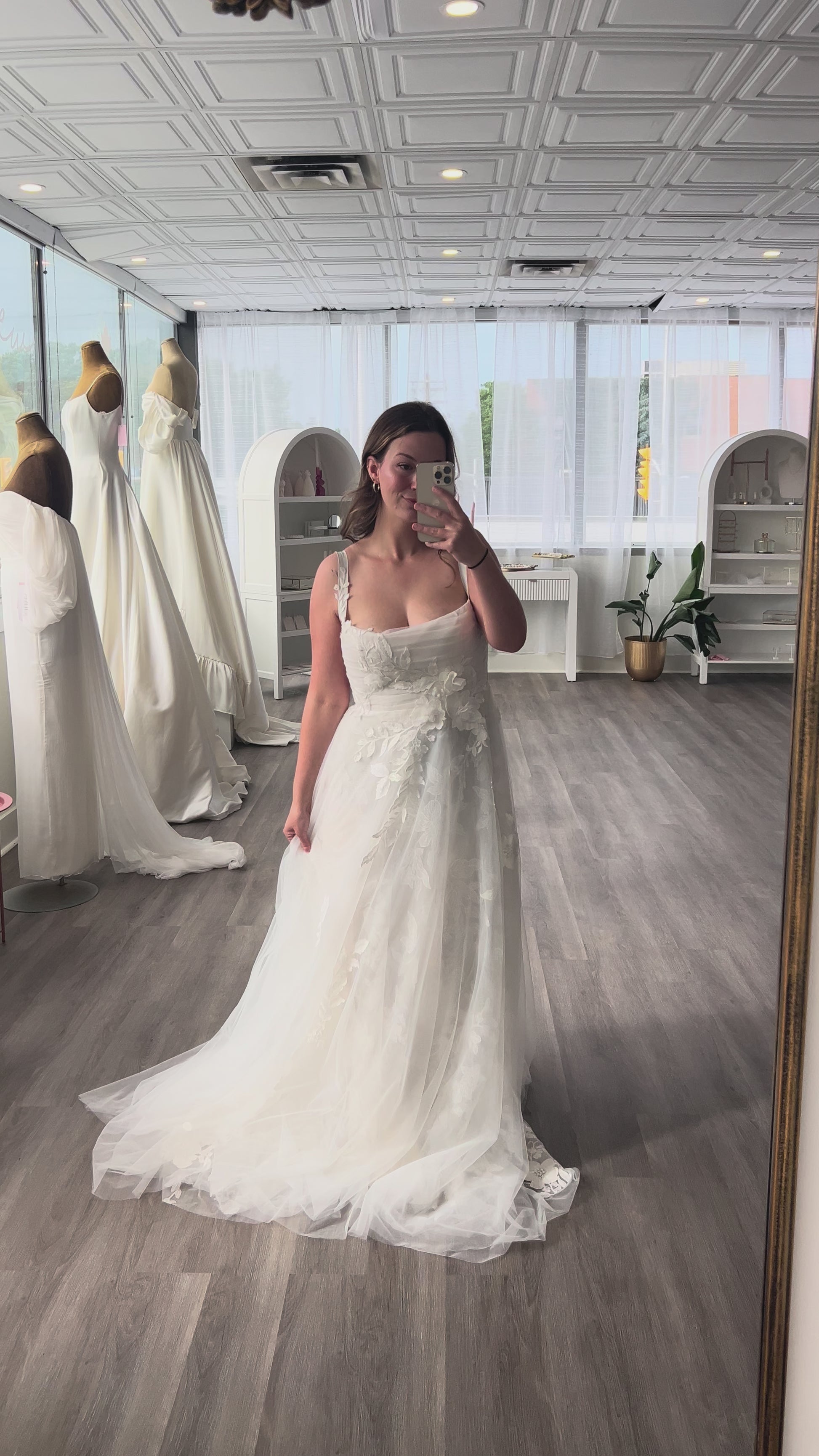 Gia by Ouma Bridal with a flowy soft aline featuring floral tulles and delicate lace appliques