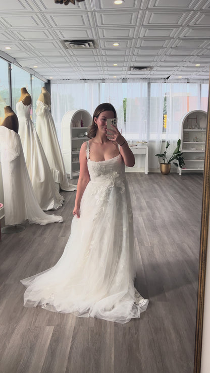 Gia by Ouma Bridal with a flowy soft aline featuring floral tulles and delicate lace appliques