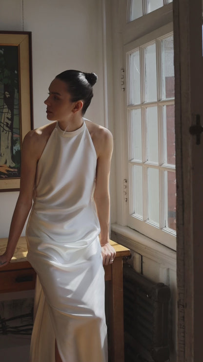 Closeup of the model laurene gown, satin high neck model