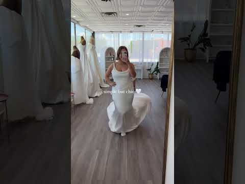 Lizzie wearing Asymettrical soft english tulle and satin draped, shown in bridal size 18