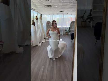 Lizzie wearing Asymettrical soft english tulle and satin draped, shown in bridal size 18